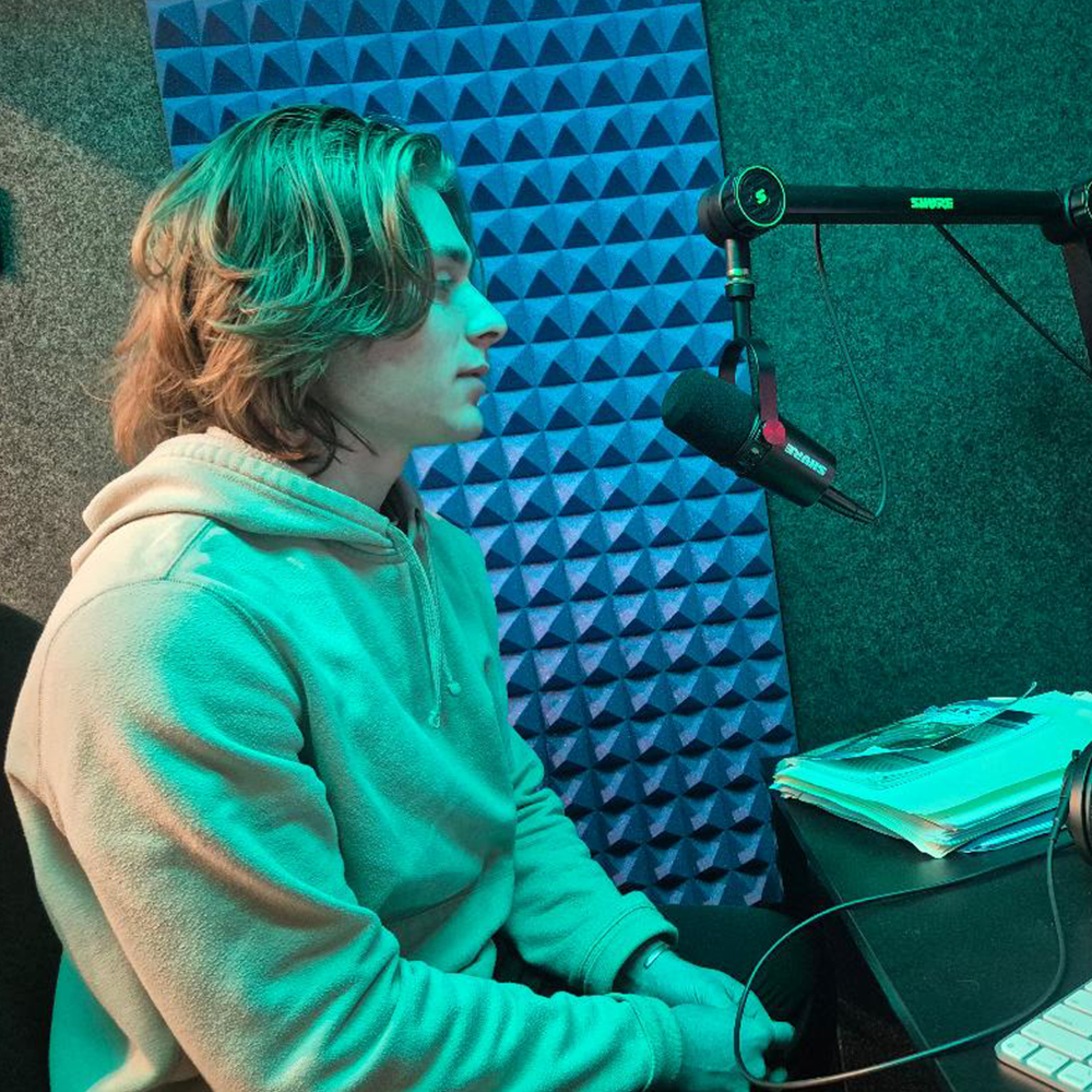 Student working on podcast